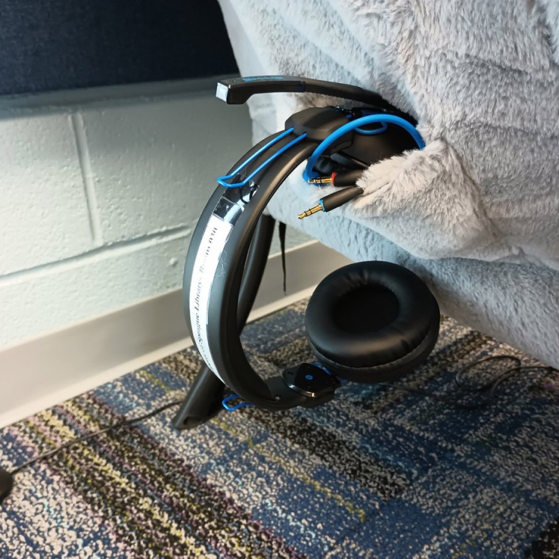noise-cancelling headphone in chair pocket