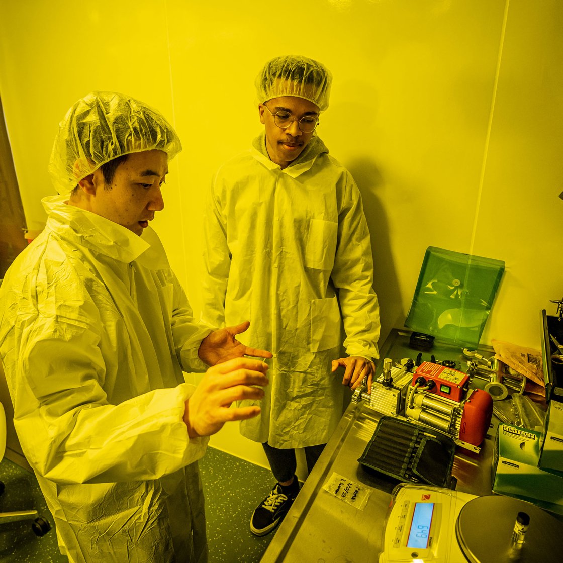 student and mentor working in a physics lab