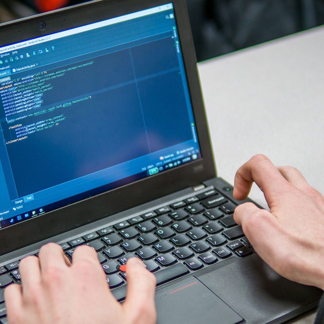 student working on programming project