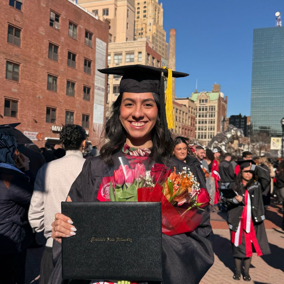 A picture of Victoria Aceves-Garcia in her graduation gear.