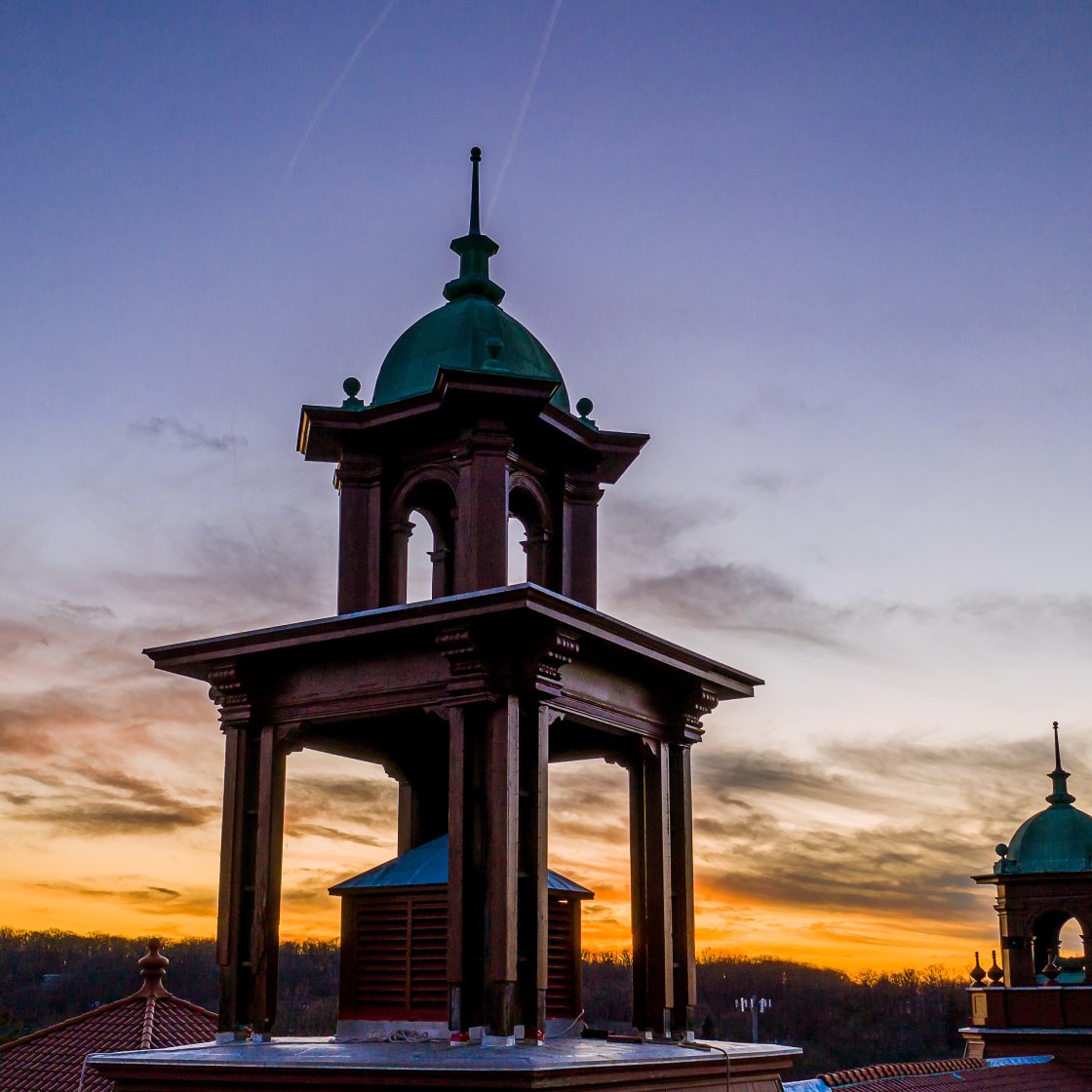 Aerial view of Cole Hall bell towers at dusk