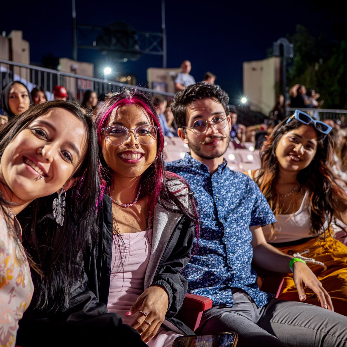 four senior students at senior send off smiling