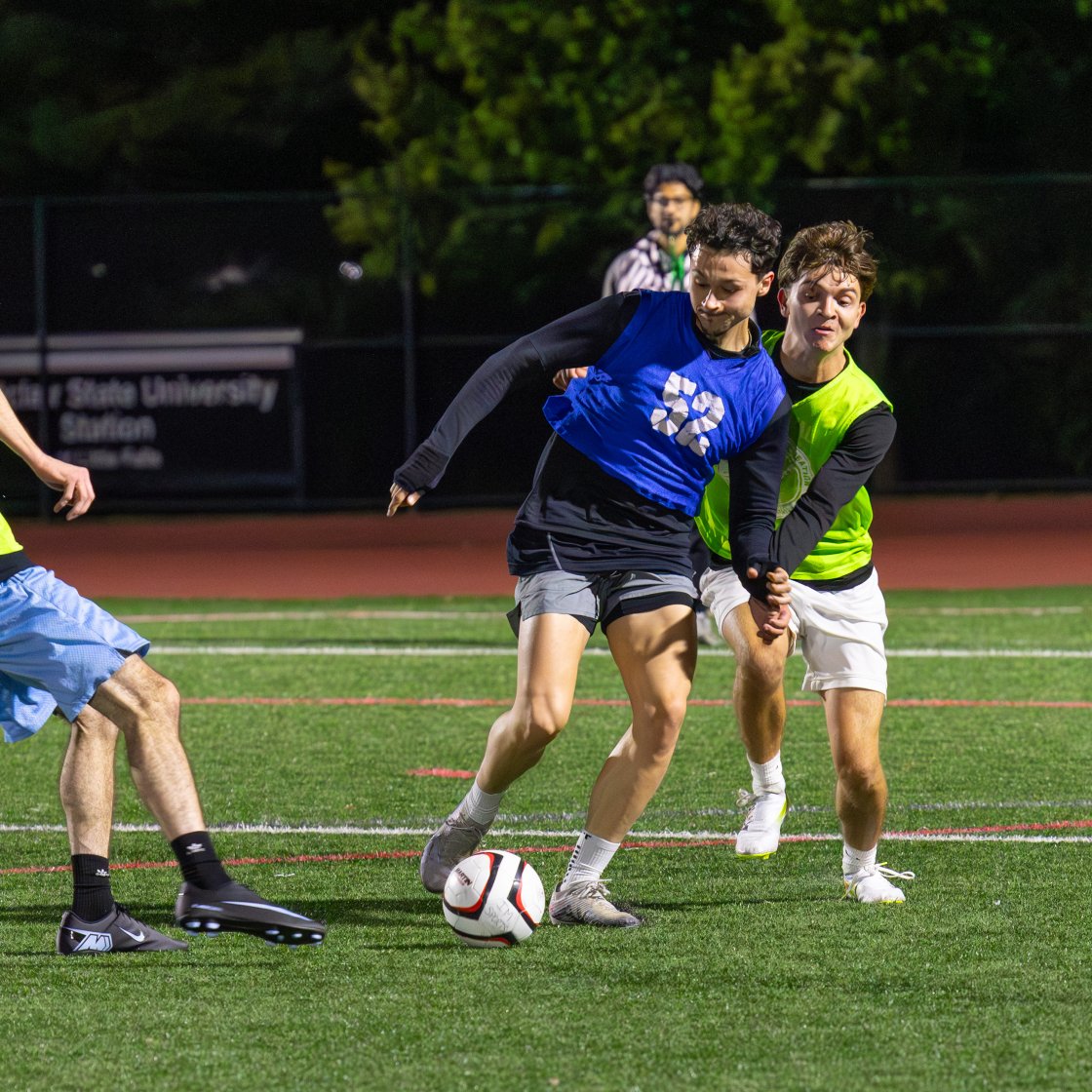 students playing outdoor soccer intramural sports