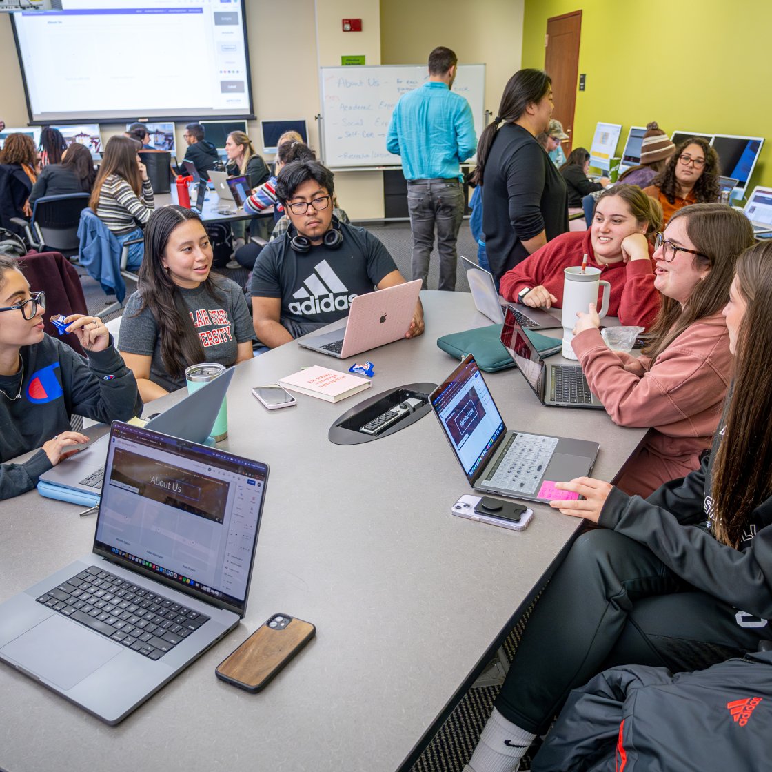 a group of IAC students works together