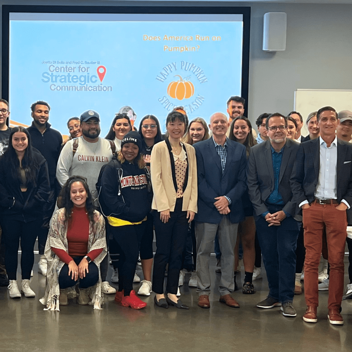 Group photo of students and faculty involved in the Strategic Communications Center.