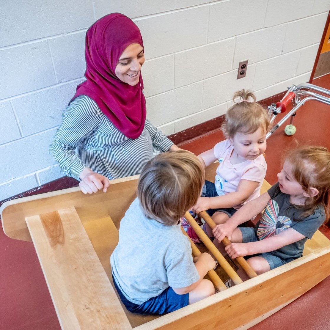 Teacher with young students 