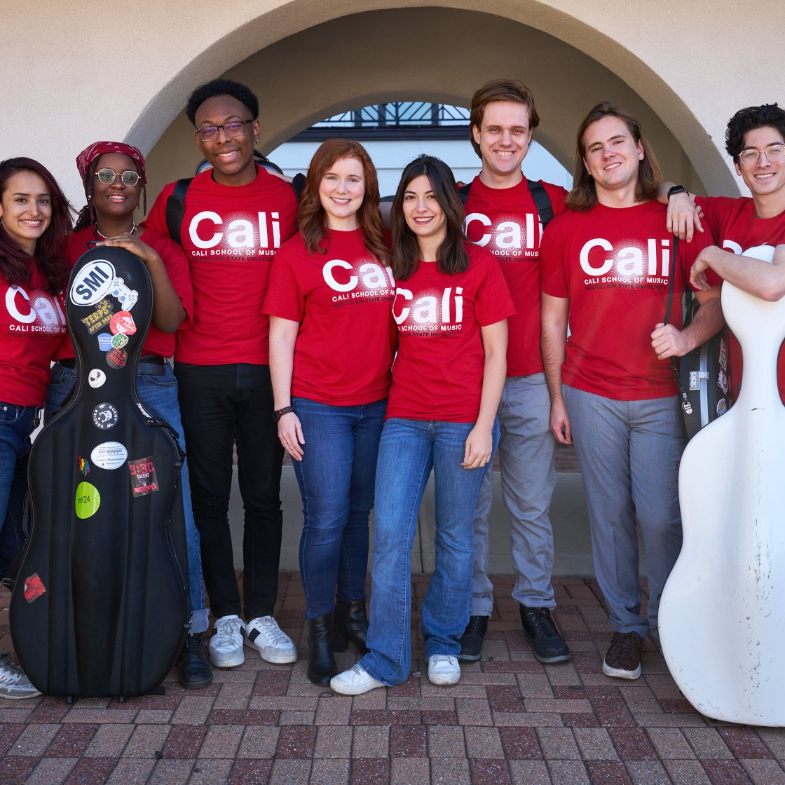 Cali Collective in Cali School of Music Red t-shirts in group photo