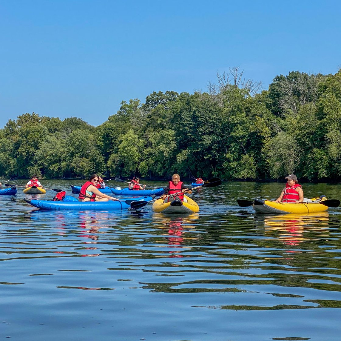 students outside kayaking