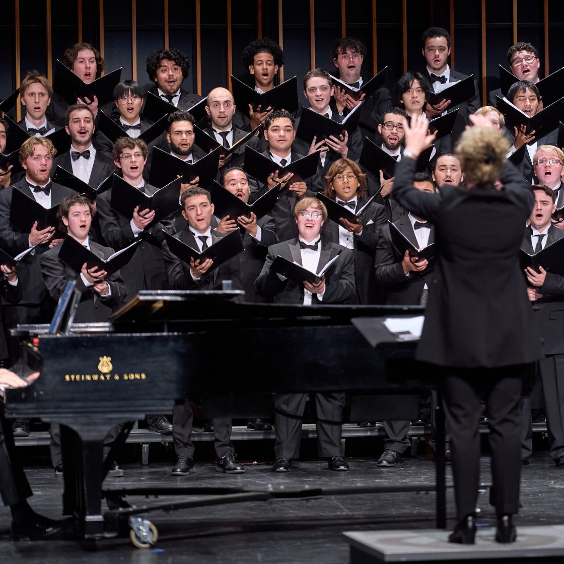 University Singers on stage of Kasser Theater