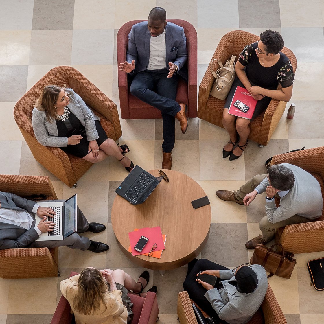 Faculty and staff collaborating in a group discussion