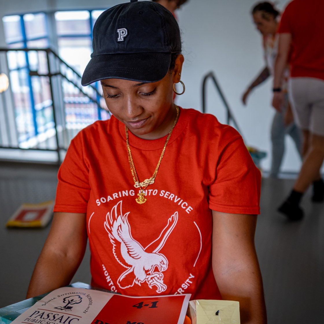 Student Ana Rita Serving at soaring into service event