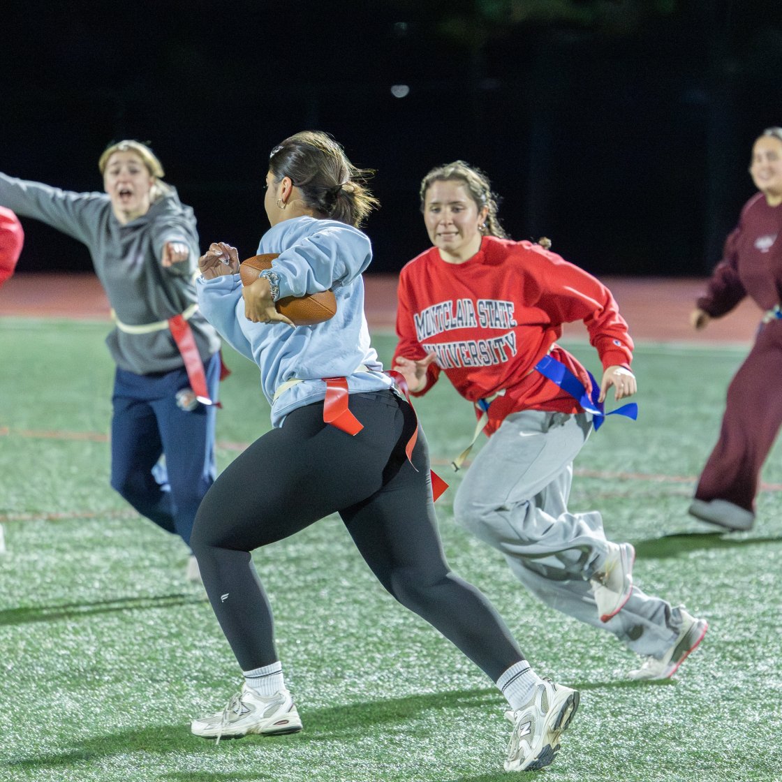 students playing flag football