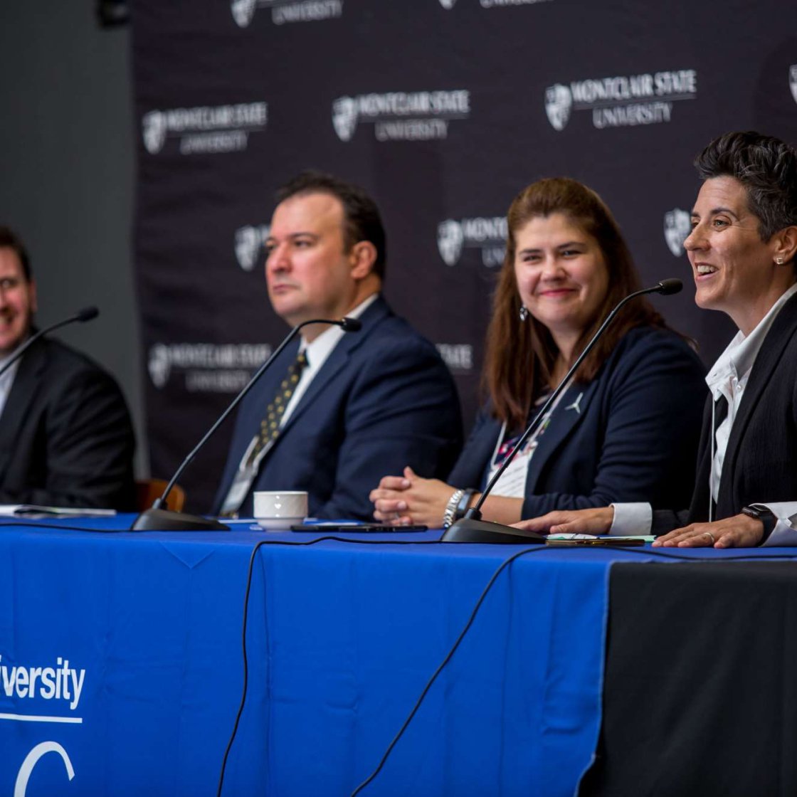 Center staff on a panel at an event