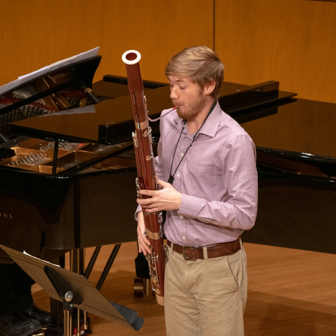 Bassoonist on stage with collaborative pianist