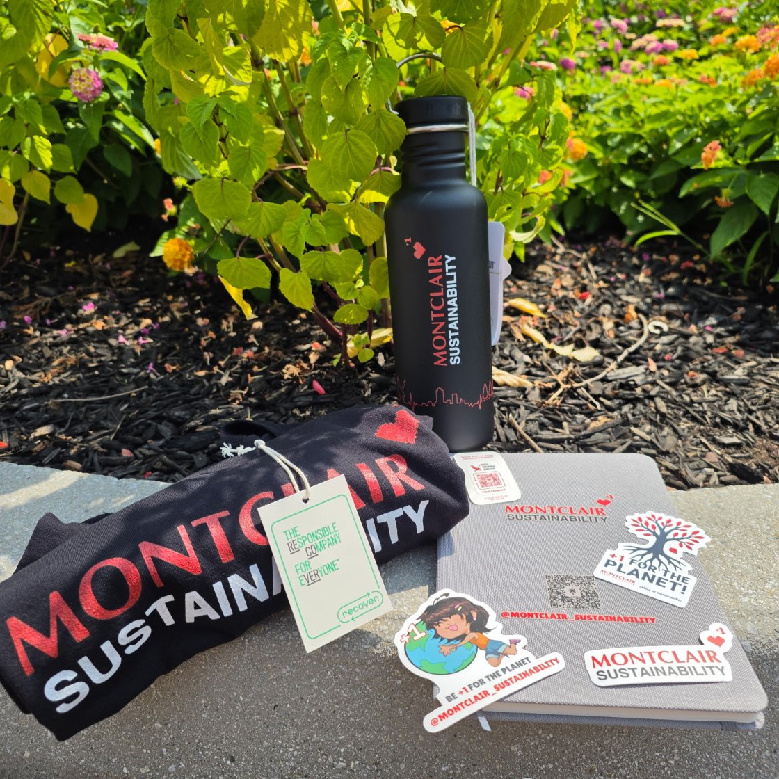 Prizes from the Office of Sustainability: a t-shirt, water bottle, journal, and stickers.