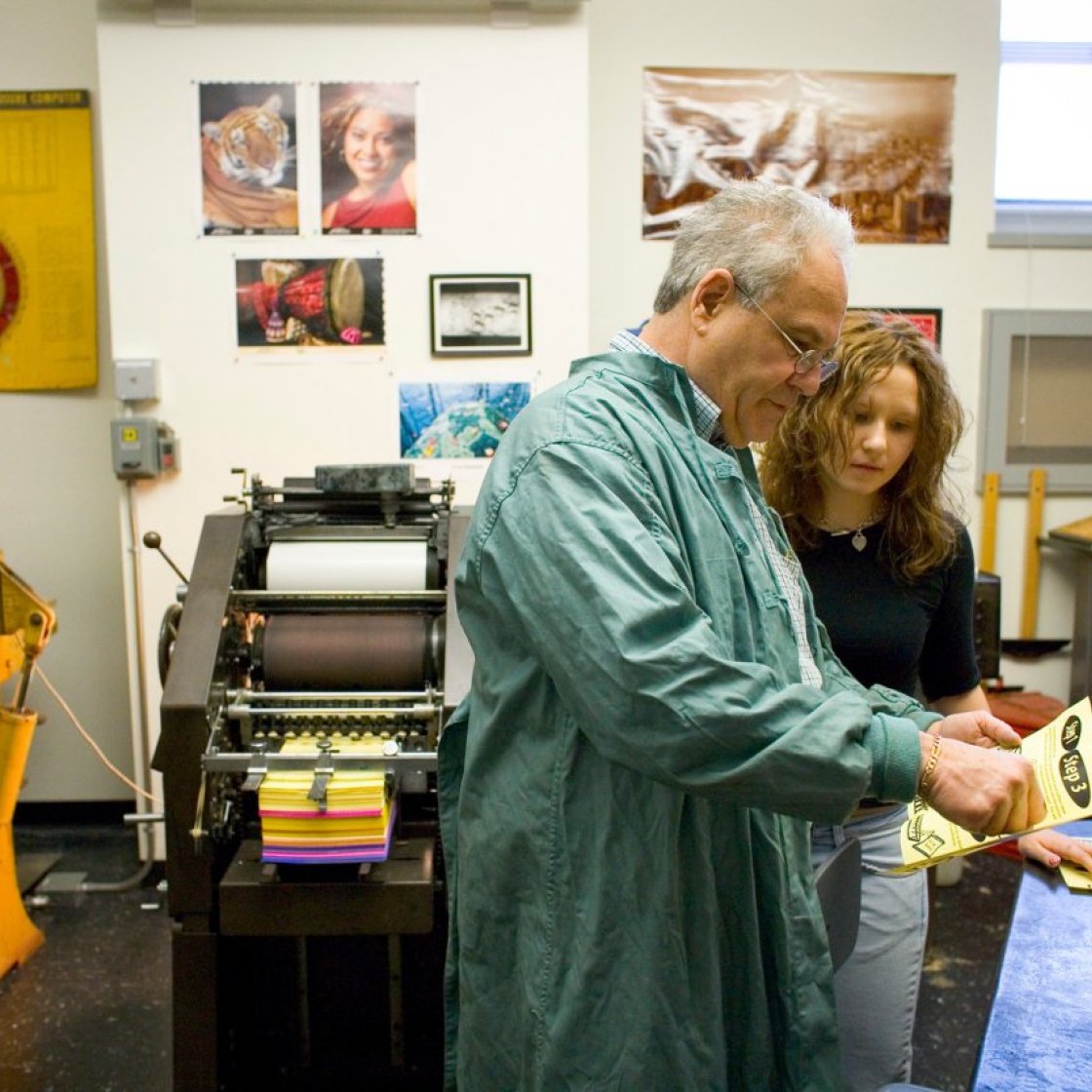 Instructor showing a student proper techniques