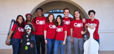 Cali Collective in Cali School of Music Red t-shirts in group photo