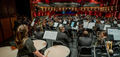 Ensemble on stage in Kasser Theater
