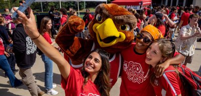 rocky and students taking a selfie