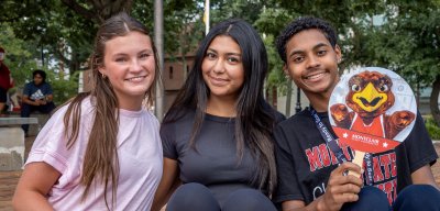 Three students posing for a photo