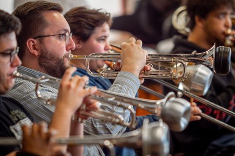 Gavin Ard rehearsing trumpet with Wind Symphony