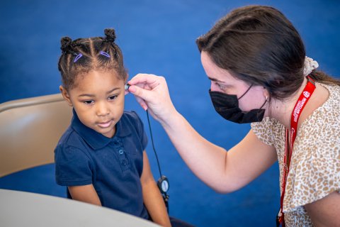 Montclair audiology student Nicole Genser administering a hearing test