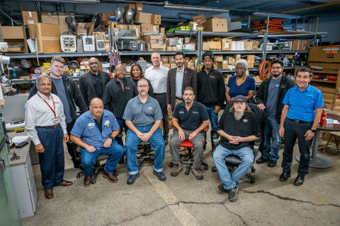 Montclair’s first cohort of Facilities apprentices are shown with their mentors, Facilities management and the University President. Seated from left, Keith Benjamin, Kevin Johnson, Patrick Hickey and Kevin Lepore. Standing from left, Rajendra Shah, David Lobefaro, Dwight Threepersons, Jhoan Noguiera, Shakira Jackson, Shawn Connolly, Montclair President Jonathan Koppell, Daniel Miller, Amy Ferdinand, Kevin Rizzo and Joseph Marzulla.
