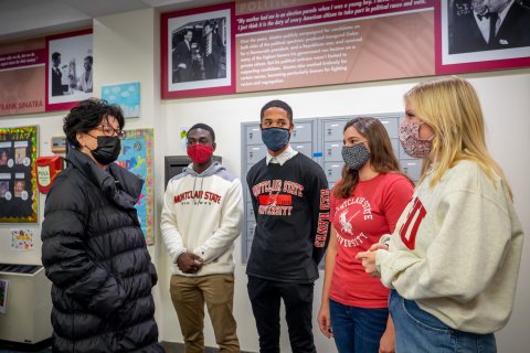 Tina Sinatra speaking with students on campus