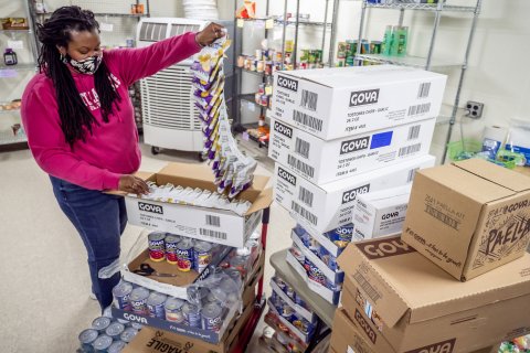 woman unpacking boxes
