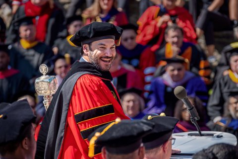 President Koppell smiles at attendees on campus