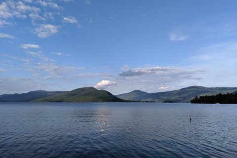Ocean with land in the background. 