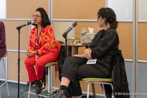 three authors speaking about book