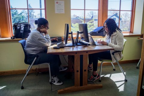 two students sitting at computers