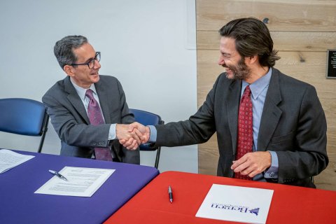 President Koppell shaking hands with Bergen County Community College President Dr. Eric M. Friedman