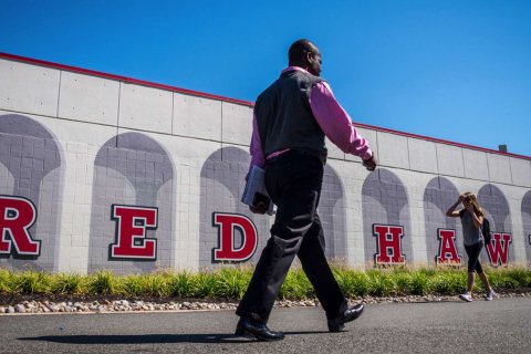 Individuals walking on Montclair campus