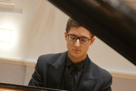 Ryan Bridge at the piano