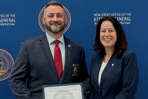Chief Timothy Fox and NJ Attorney General Jennifer Davenport pose for a photo