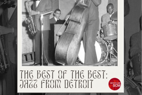 A graphic of a jazz band playing on a stage in black and white.