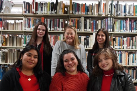 The “EveryLibrary, EveryVoice” campaign was developed and implemented by five Montclair students. Sitting from left to right are Noelia Aguirre Reyes (’26), Hallie Lippey (’25) and Grace Velazquez (’27). Standing left to right are Libby Brennan (’25), Assistant Teaching Professor and Montclair PRSSA Chapter Advisor Erin Weinberg and Mary Lage (’25).