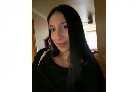 A selfie of a woman dressed in black