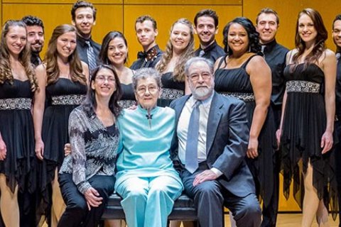Christine Consales, Kay Consales and J. Douglas Peters (seated) with Musical Theatre and Vocal Performance majors of the John J. Cali School of Music who performed at the dedication ceremony under the direction of Professors Clay James and Gregory J. Dlugos.