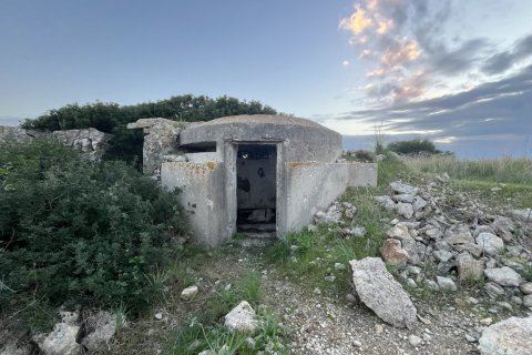 A WW2-era concrete bunker on an Italian beach