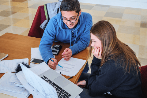 Students study together on campus.