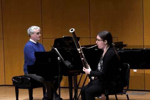 Woodwind performer on stage