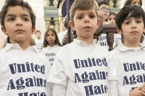 image of children wearing United Against Hate shirts