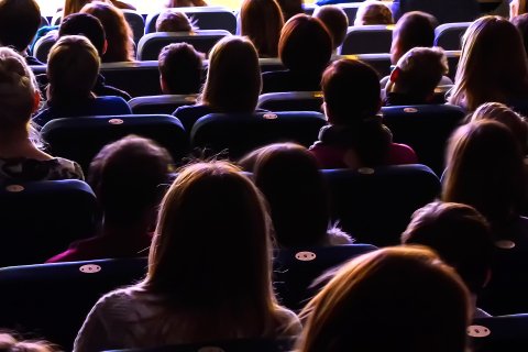 People in a theatre