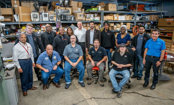 Montclair’s first cohort of Facilities apprentices are shown with their mentors, Facilities management and the University President. Seated from left, Keith Benjamin, Kevin Johnson, Patrick Hickey and Kevin Lepore. Standing from left, Rajendra Shah, David Lobefaro, Dwight Threepersons, Jhoan Noguiera, Shakira Jackson, Shawn Connolly, Montclair President Jonathan Koppell, Daniel Miller, Amy Ferdinand, Kevin Rizzo and Joseph Marzulla.