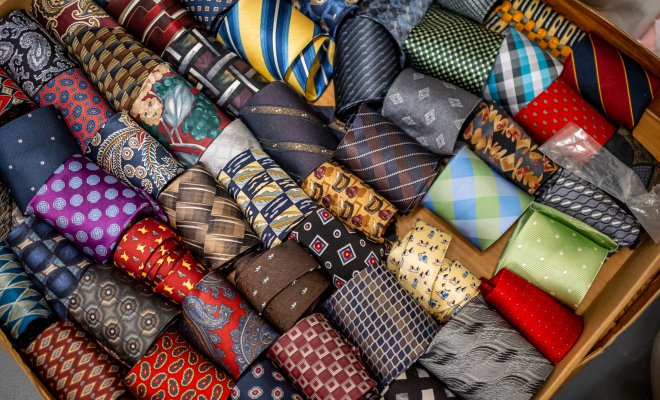 Collection of ties, all different colors.