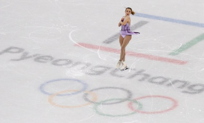 Student Isadora Williams mid-jump on the ice at the PyeongChang Olympics