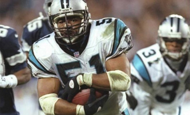 Photo of football player Sam Mills in action on the field